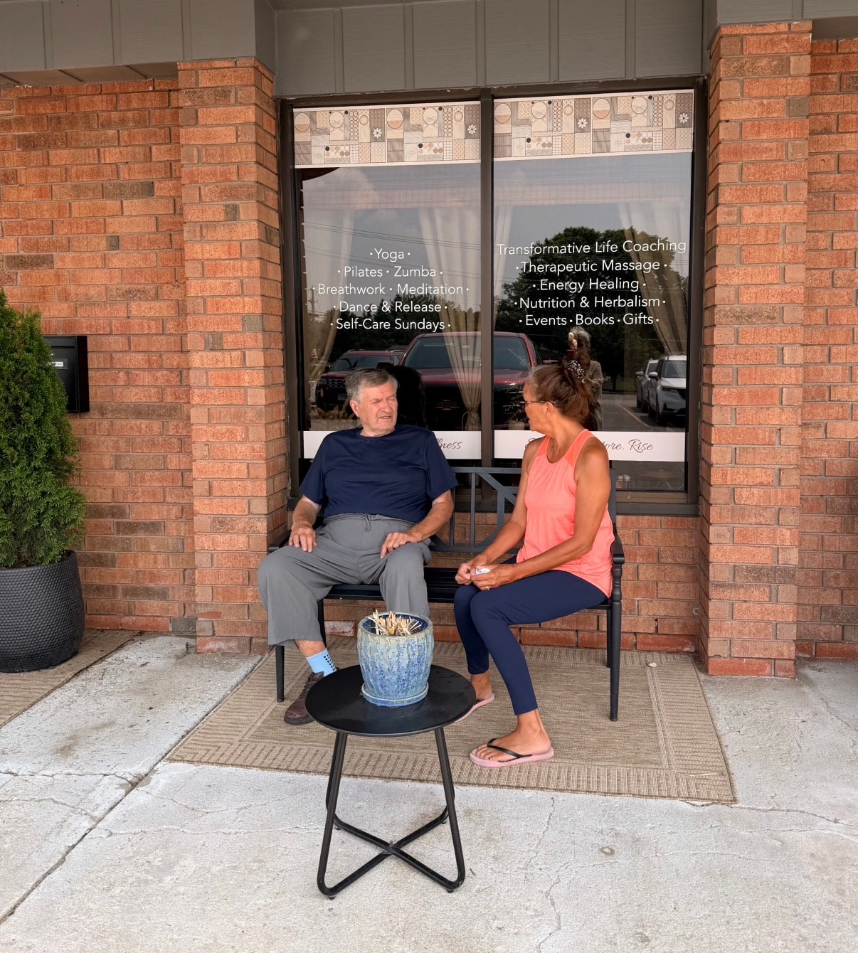 Mindful Way Studio storefront in Mokena IL — two members chatting outside the holistic wellness studio serving Tinley Park, Frankfort, and Orland Park